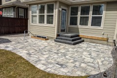 Living Earth Landscapes paving stone patio with landing